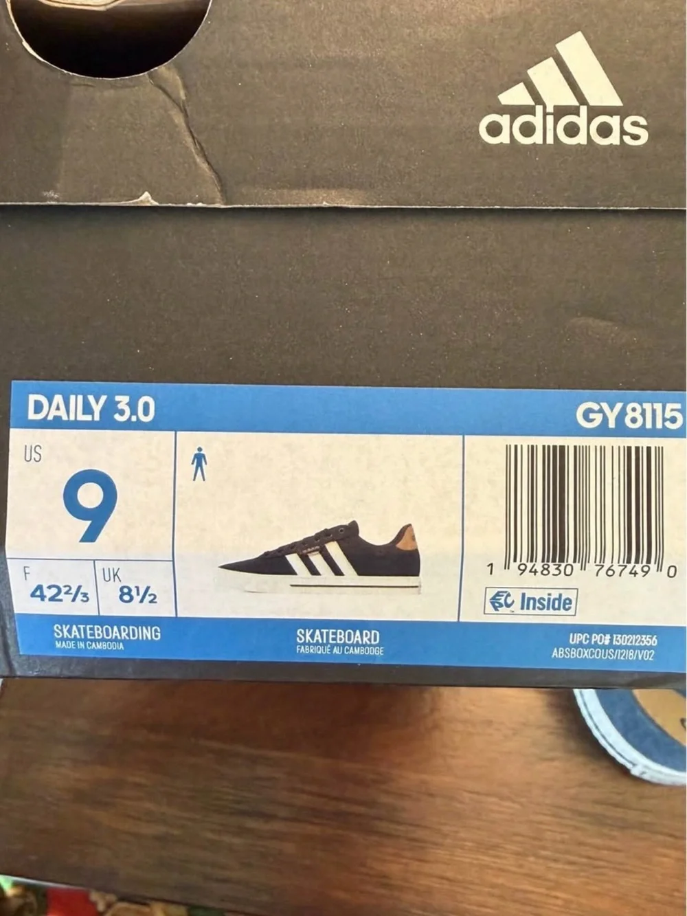 adidas Men’s Navy Canvas Sneakers with White Stripes and Gold Accents