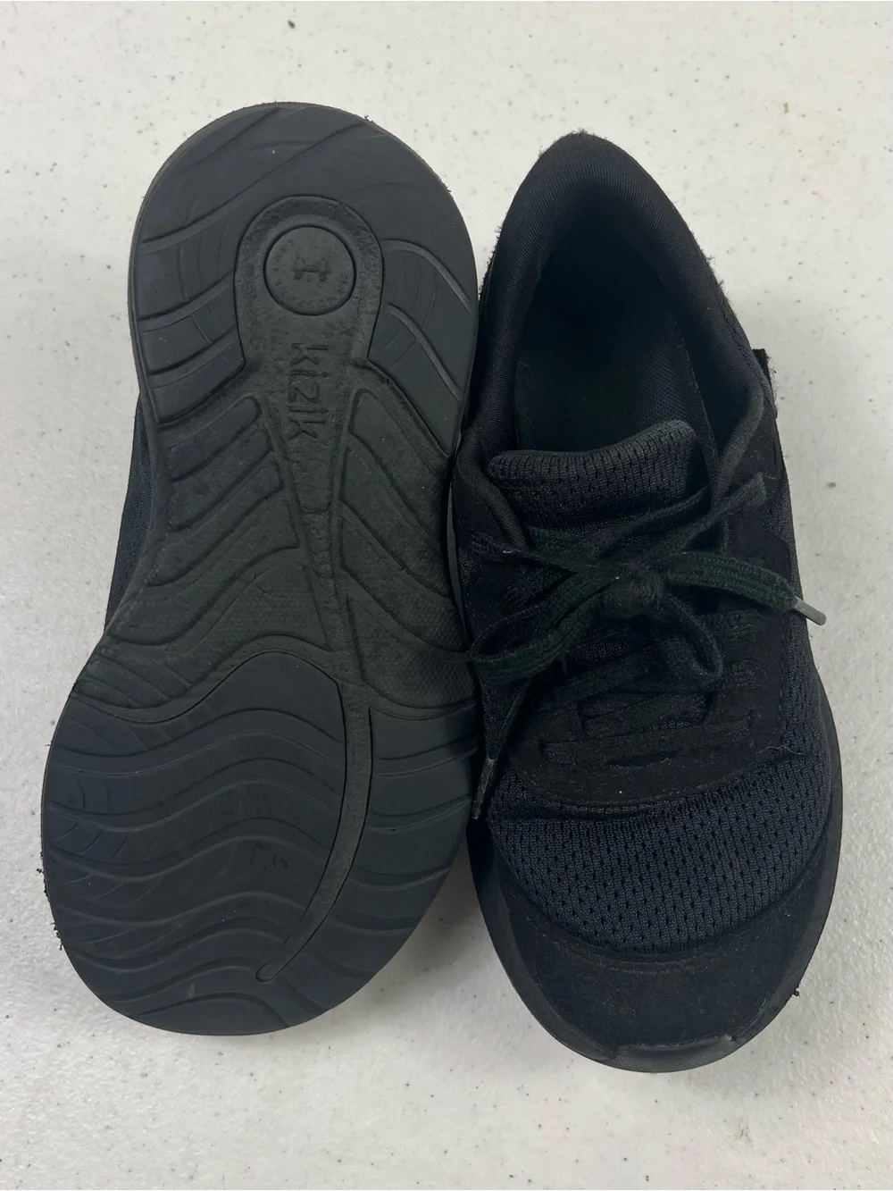 Kizik Kids All-Black Slip-On Athletic Shoe