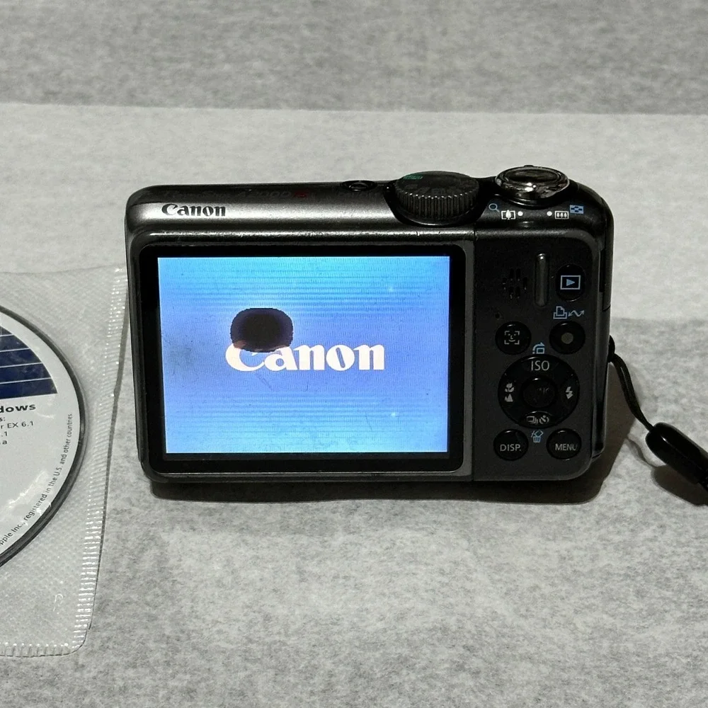 Canon PowerShot A2000 IS 10MP Digital Camera Pink For Parts Or Repair Lens Error