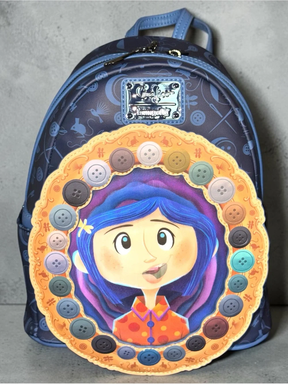 Loungefly Coraline Portal Button Frame Lenticular Mini Backpack.
