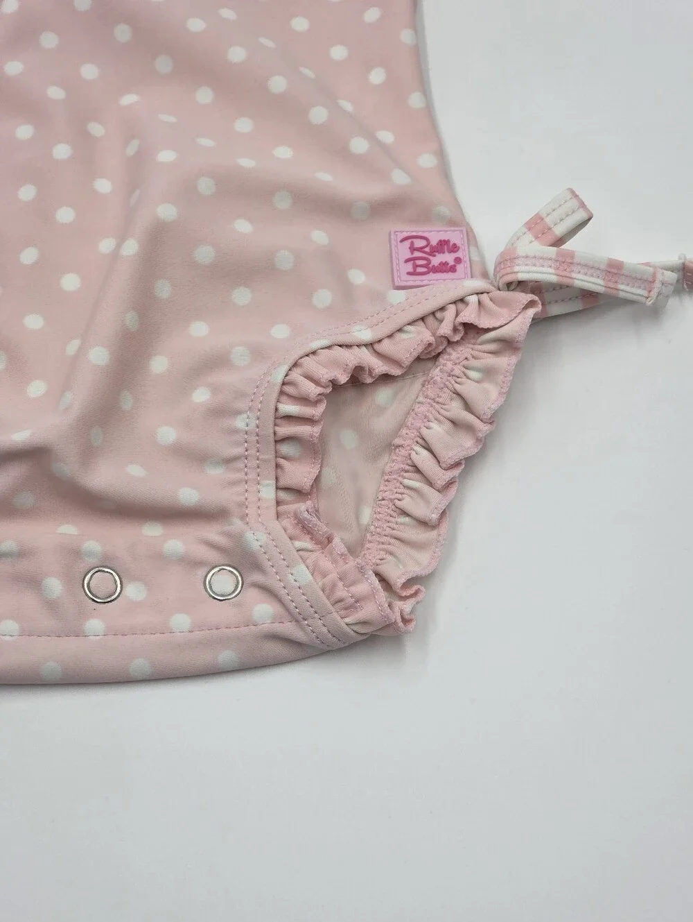 RuffleButts baby girl pink rashguard swimsuit size 3-6 months