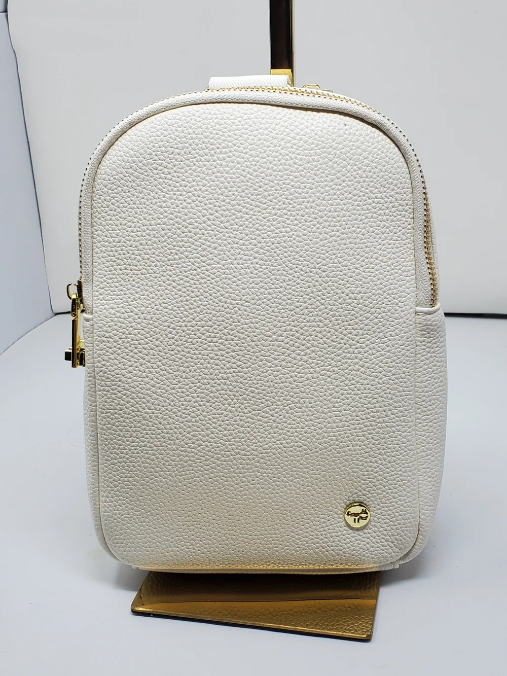 Pebbled White Leather Mini Backpack with Gold Hardware