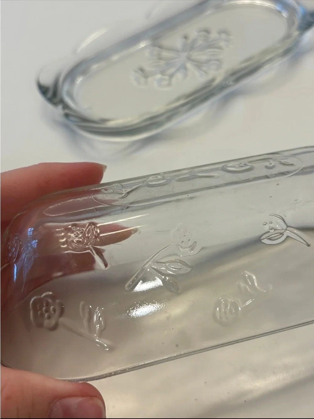 Anchor Hocking Savannah butter dish features a pressed clear glass design flower