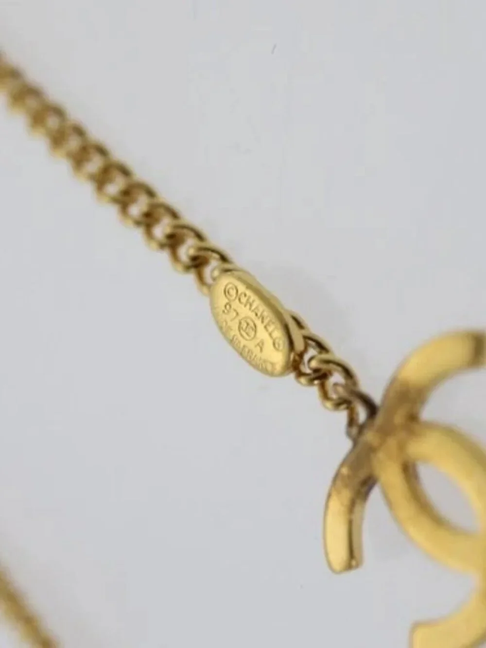 CHANEL brand	chanel color	gold