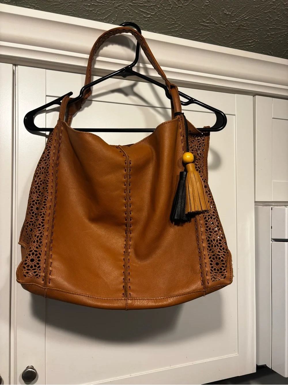 The Sak looks leather