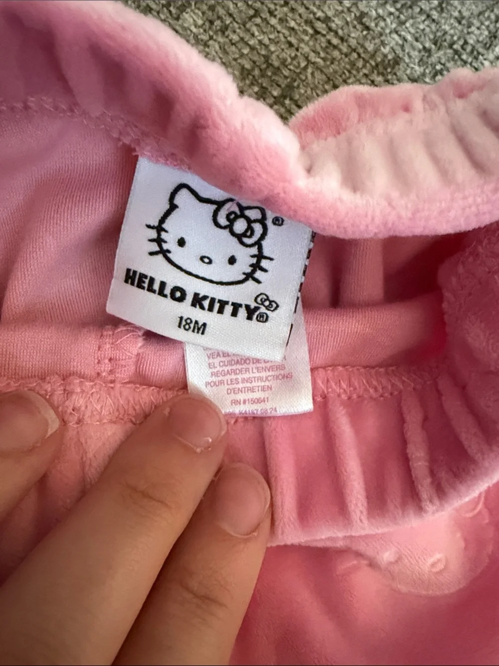 Hello Kitty lounging shoulder cuffed