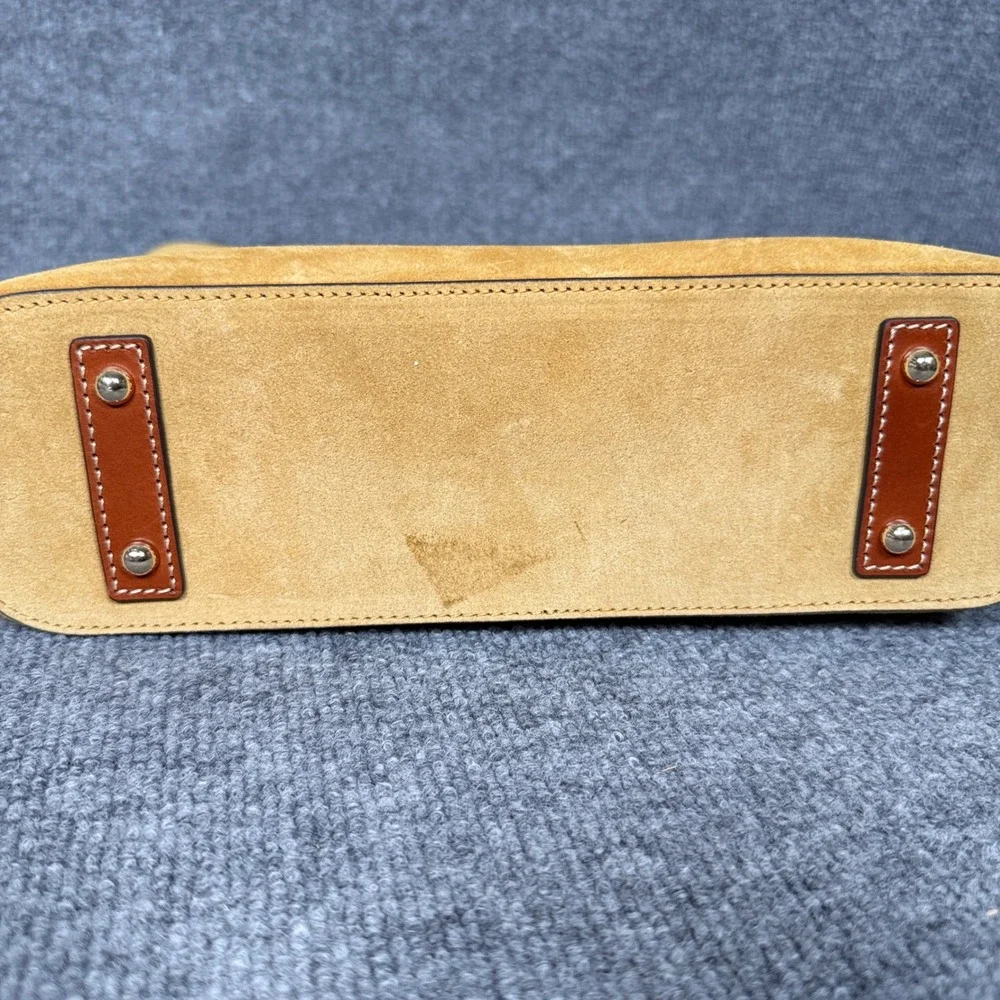 Dooney & Bourke cream stored