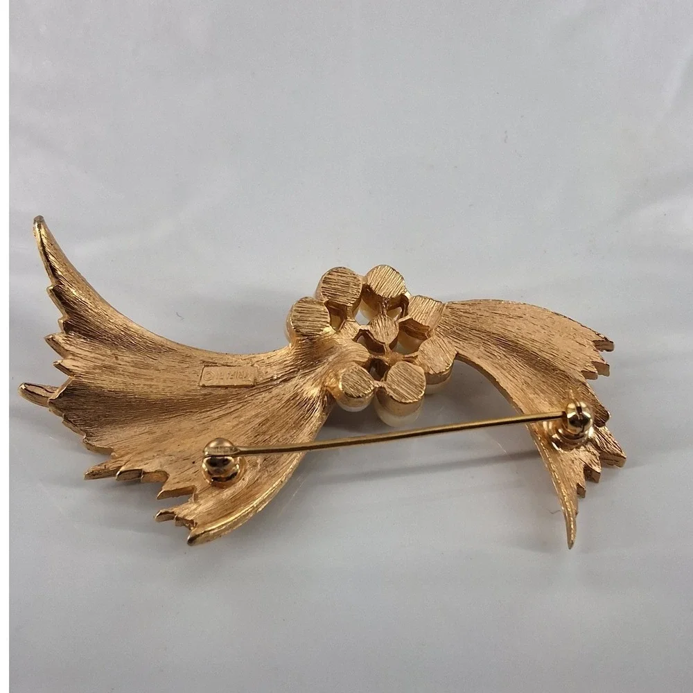 Trifari pearls wing
