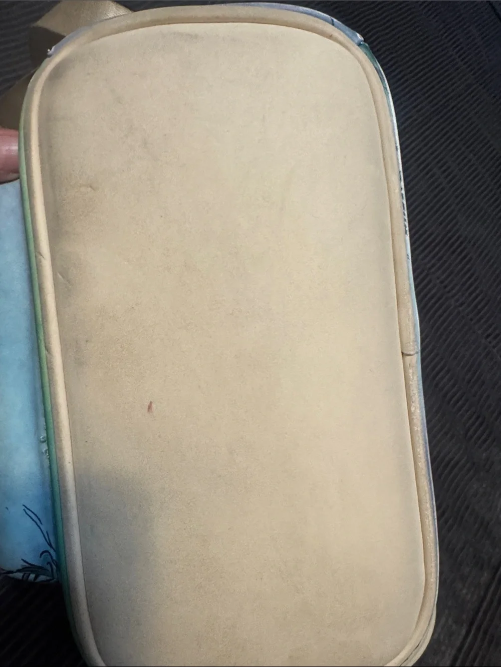 Loungefly artwork holding backpack