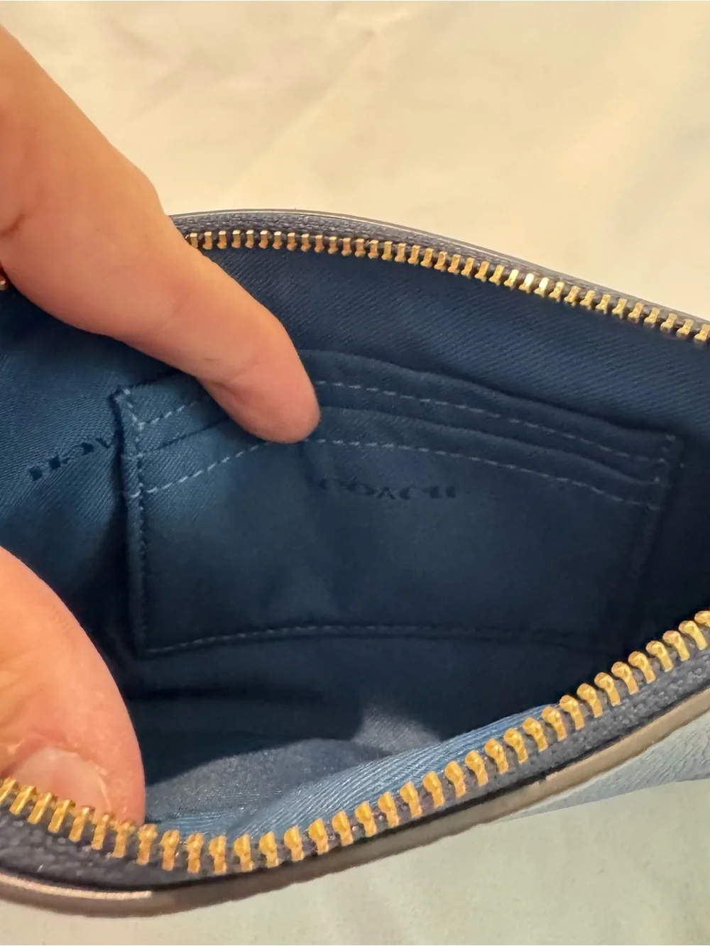 Coach zip top