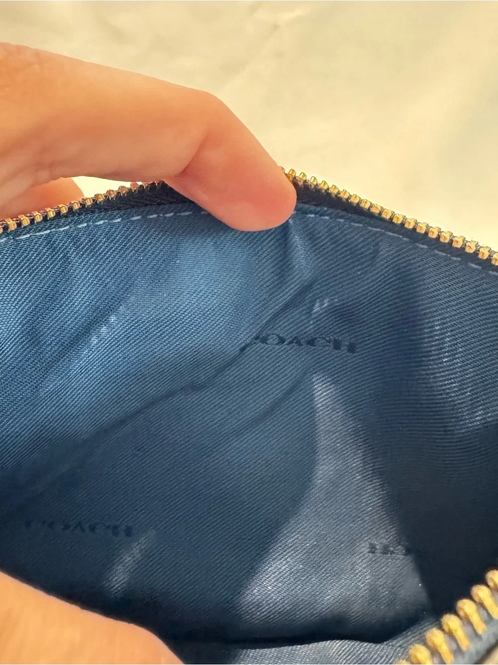 Coach zip top