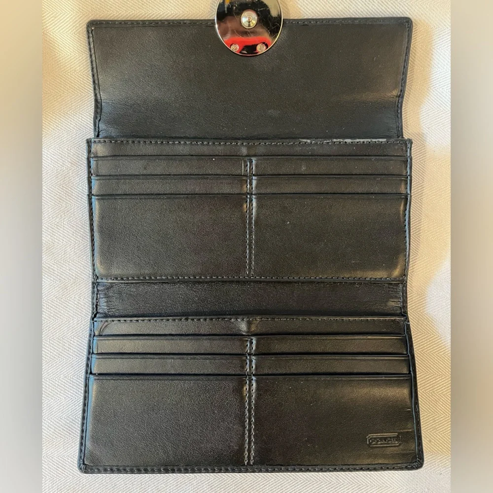 Coach black one area