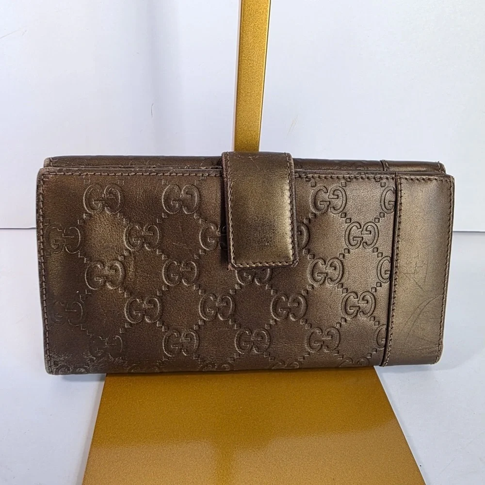 Gucci Embossed Brown Leather Wallet