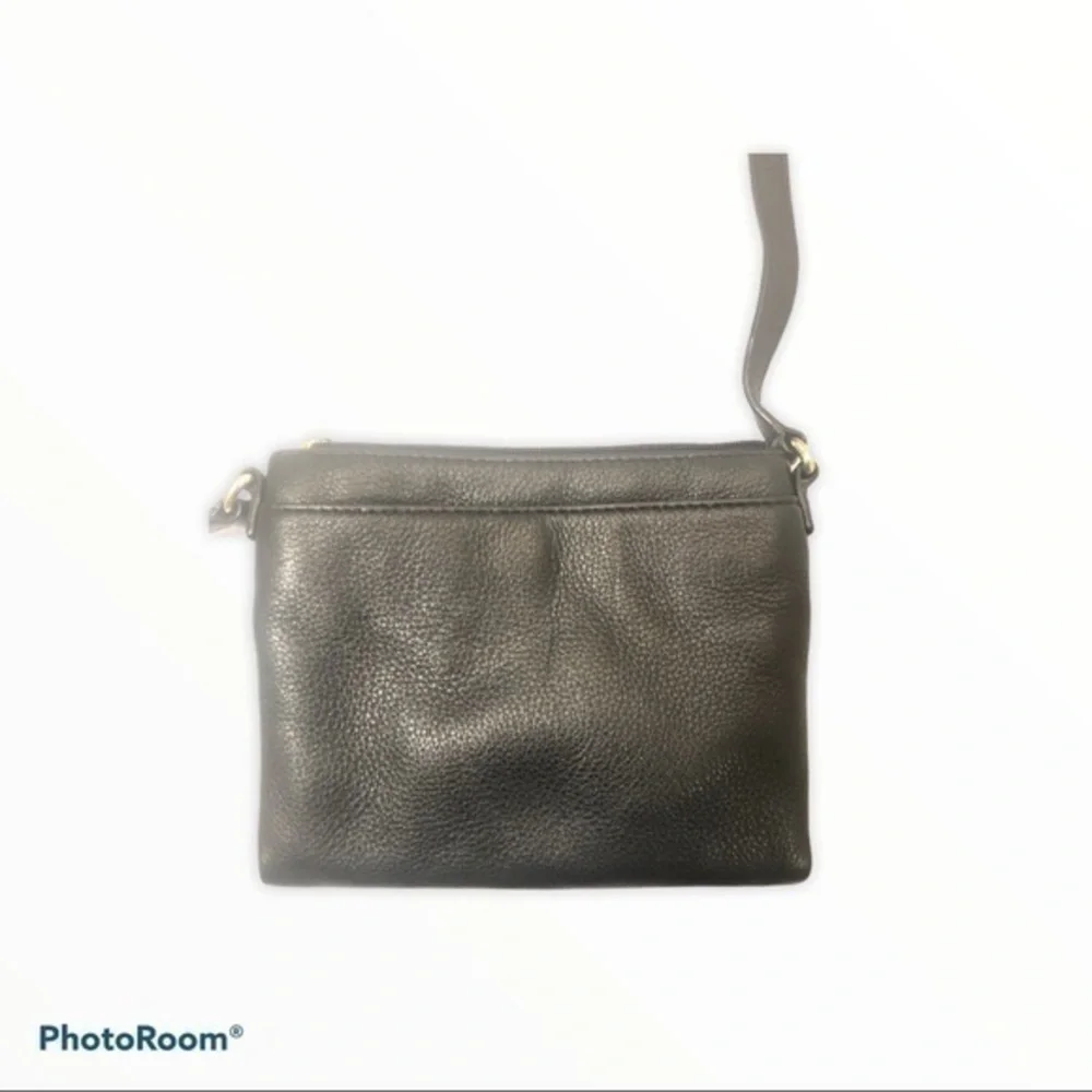 Michael Kors scratches logo