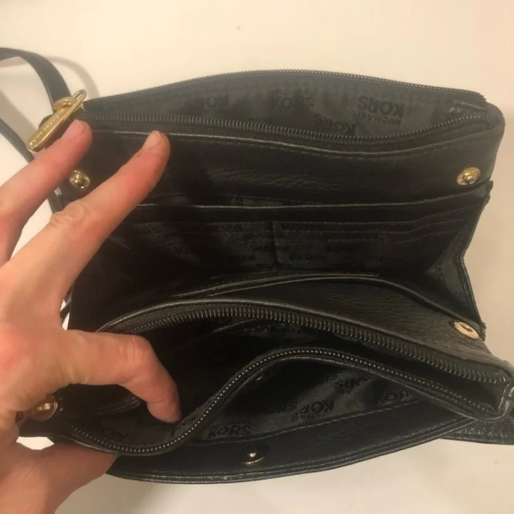 Michael Kors scratches logo