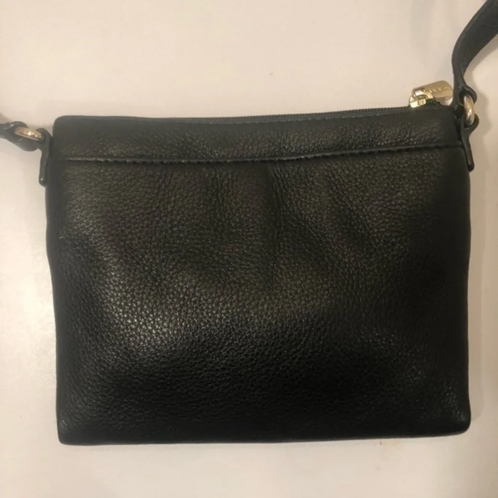 Michael Kors scratches logo