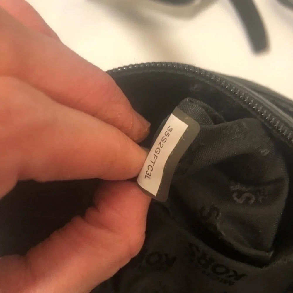 Michael Kors scratches logo