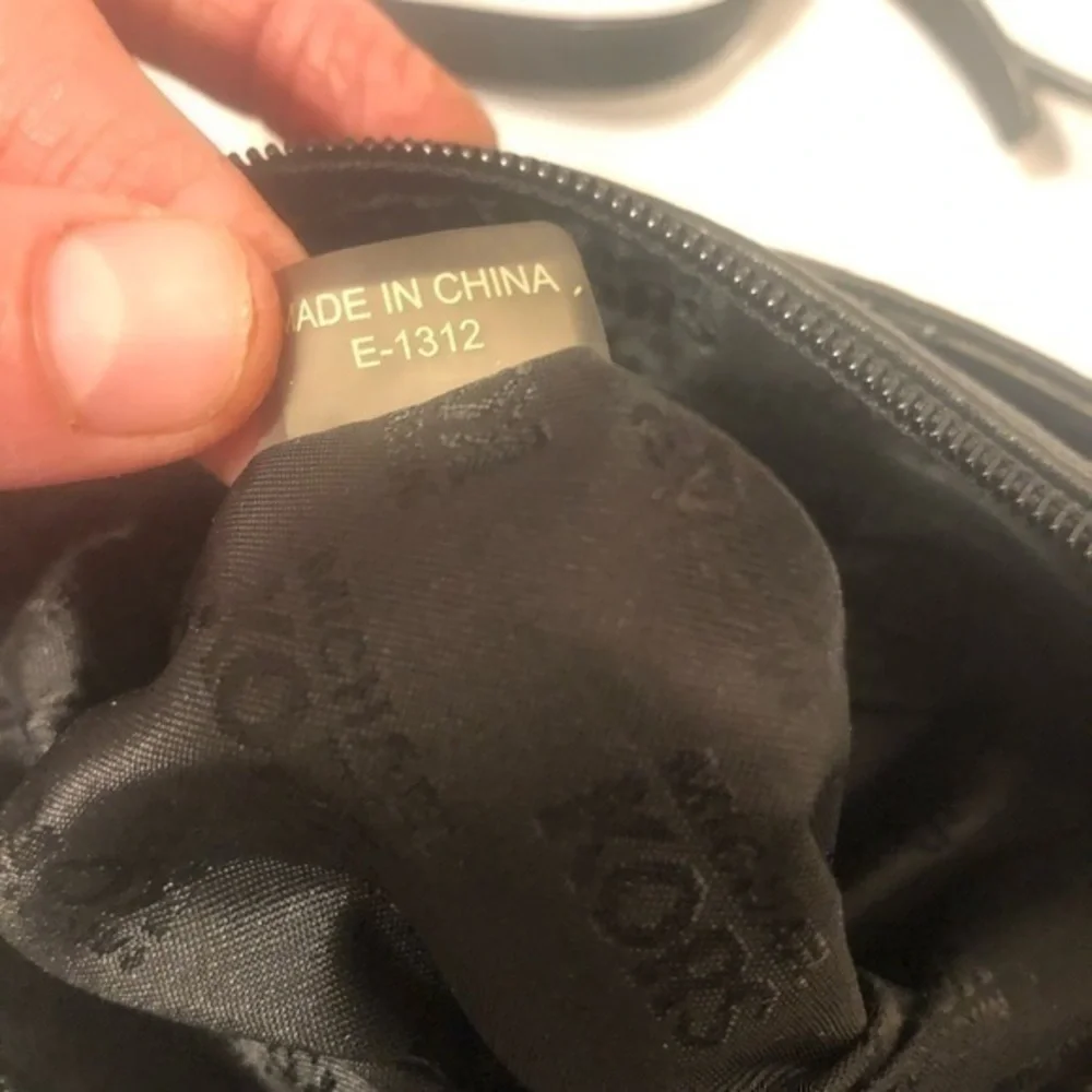 Michael Kors scratches logo