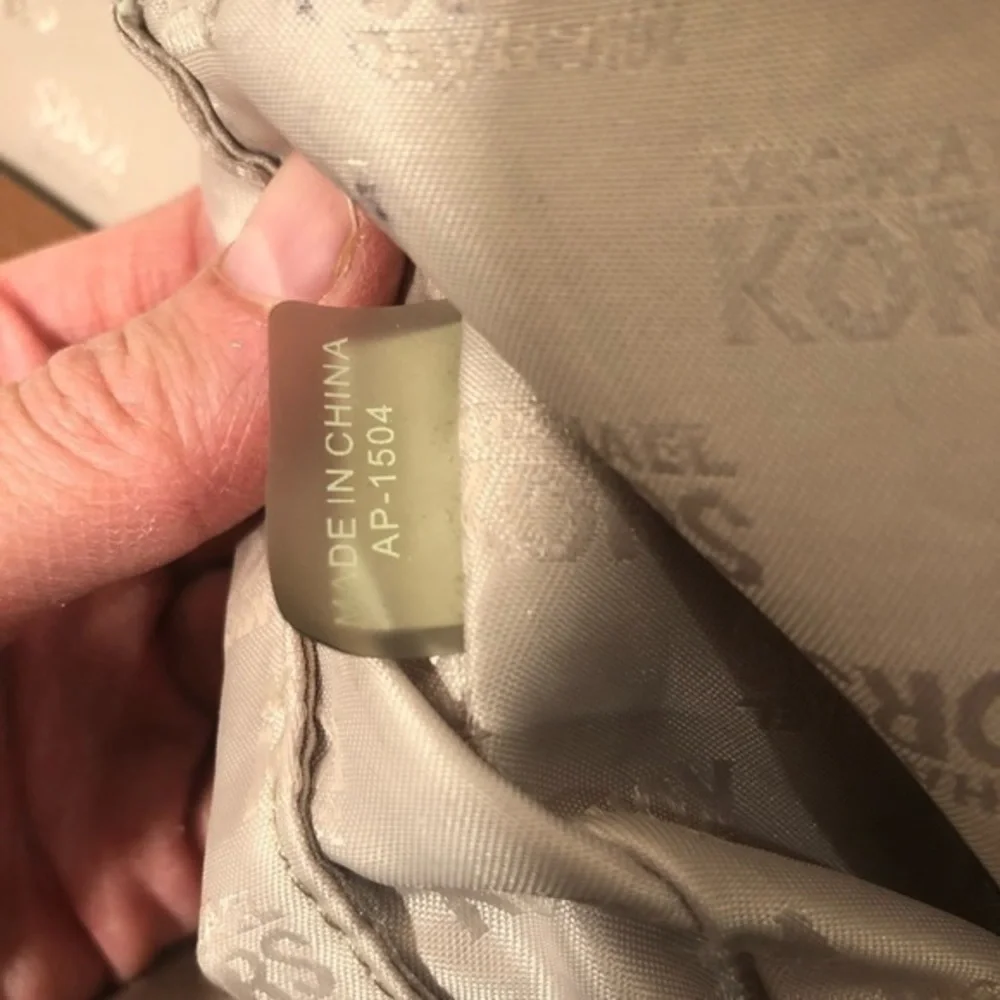 Michael kors brown leather triple compartment bag