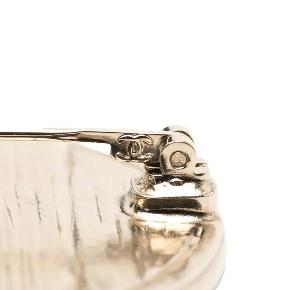 CHANEL Gold Logo Brooch