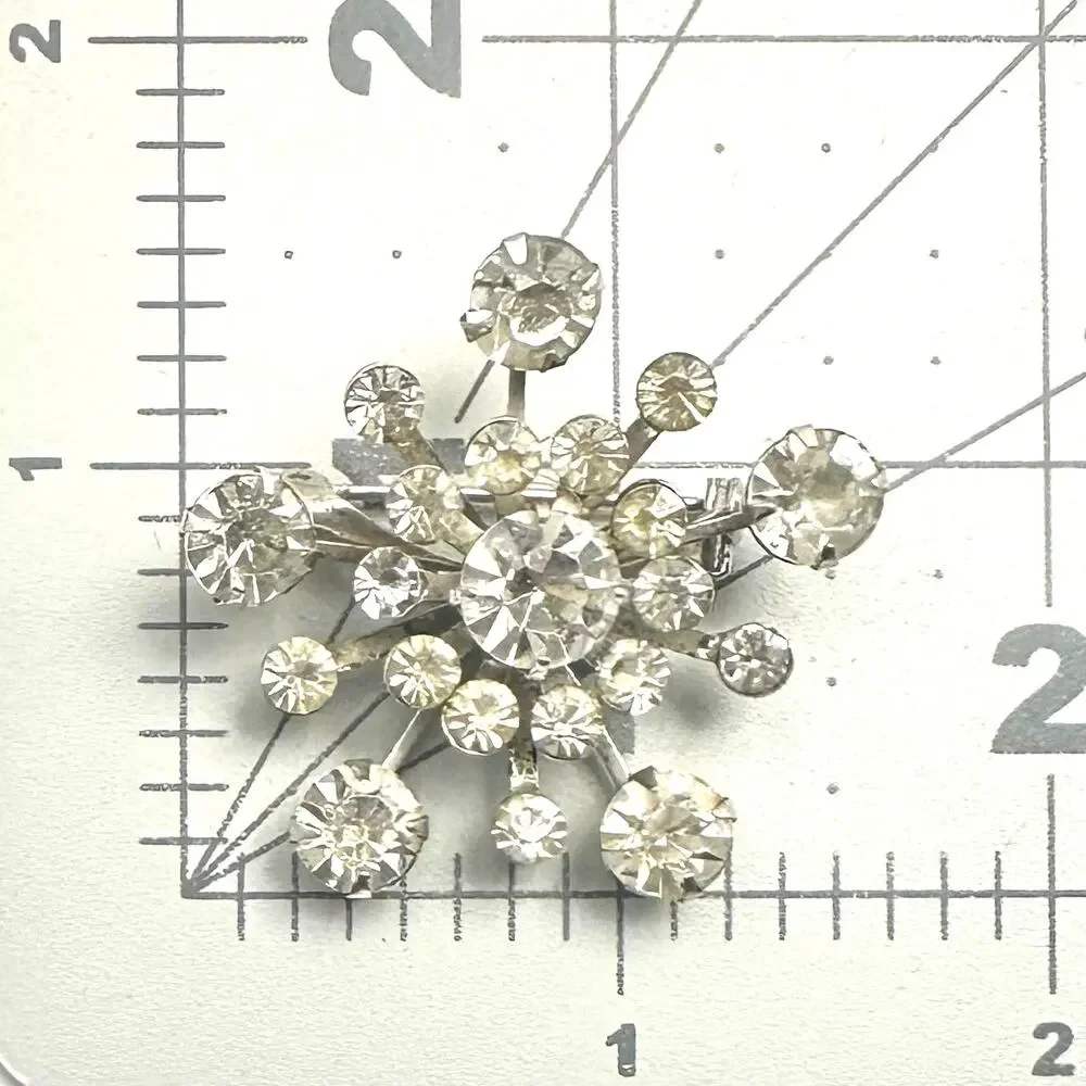 Vintage 1950s silver tone clear glass rhinestones starburst Sputnik brooch