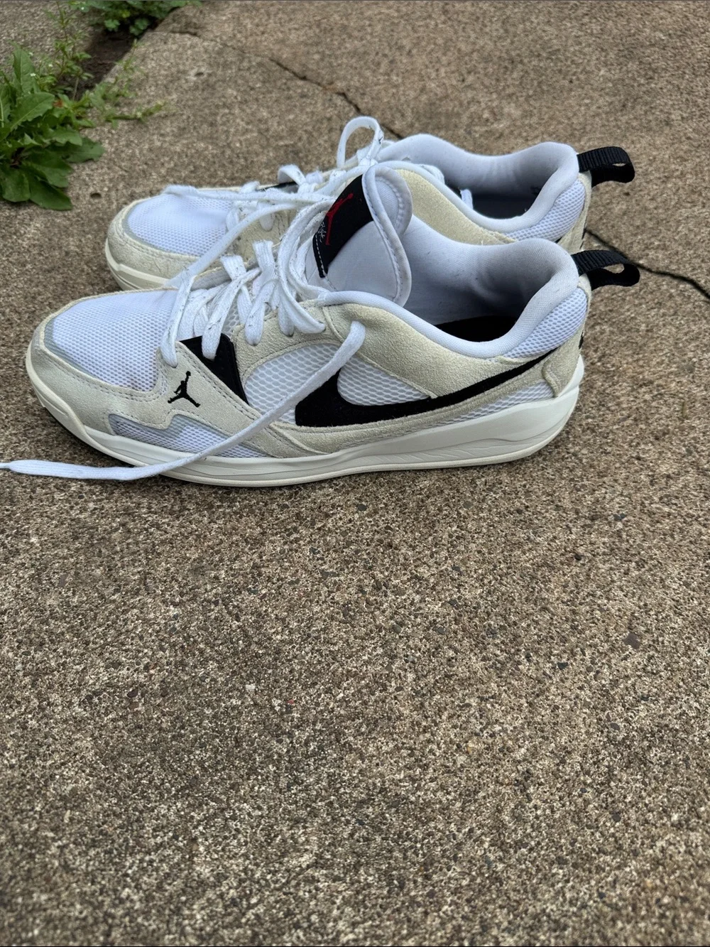 Nike Jordan Men’s White and Black Low-Top Sneakers with Red Logo