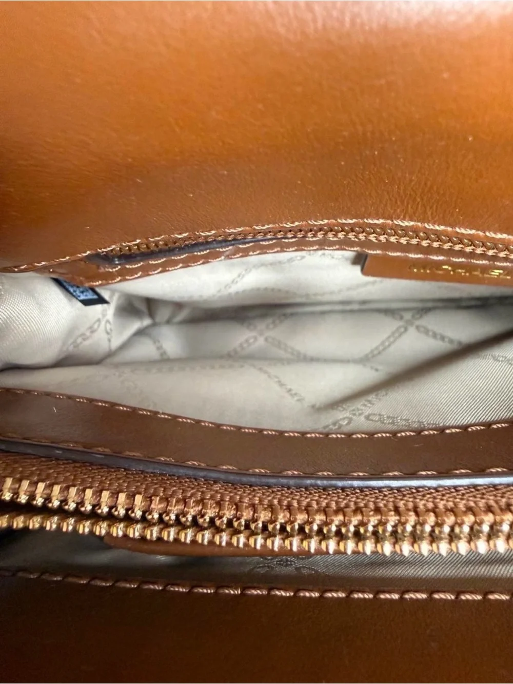 Michael Kors shoulder travel high
