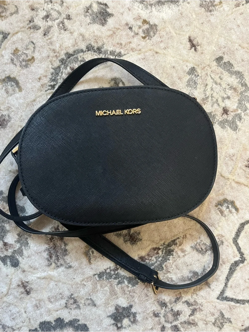 Michael Kors Black Oval Saffiano Crossbody with Gold Logo