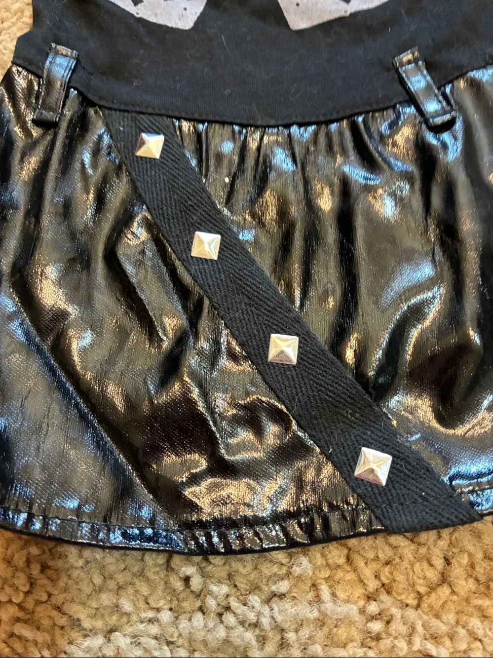 Brett Michael’s Black Skull Graphic & Shiny Skirt with Faux leather and studs.