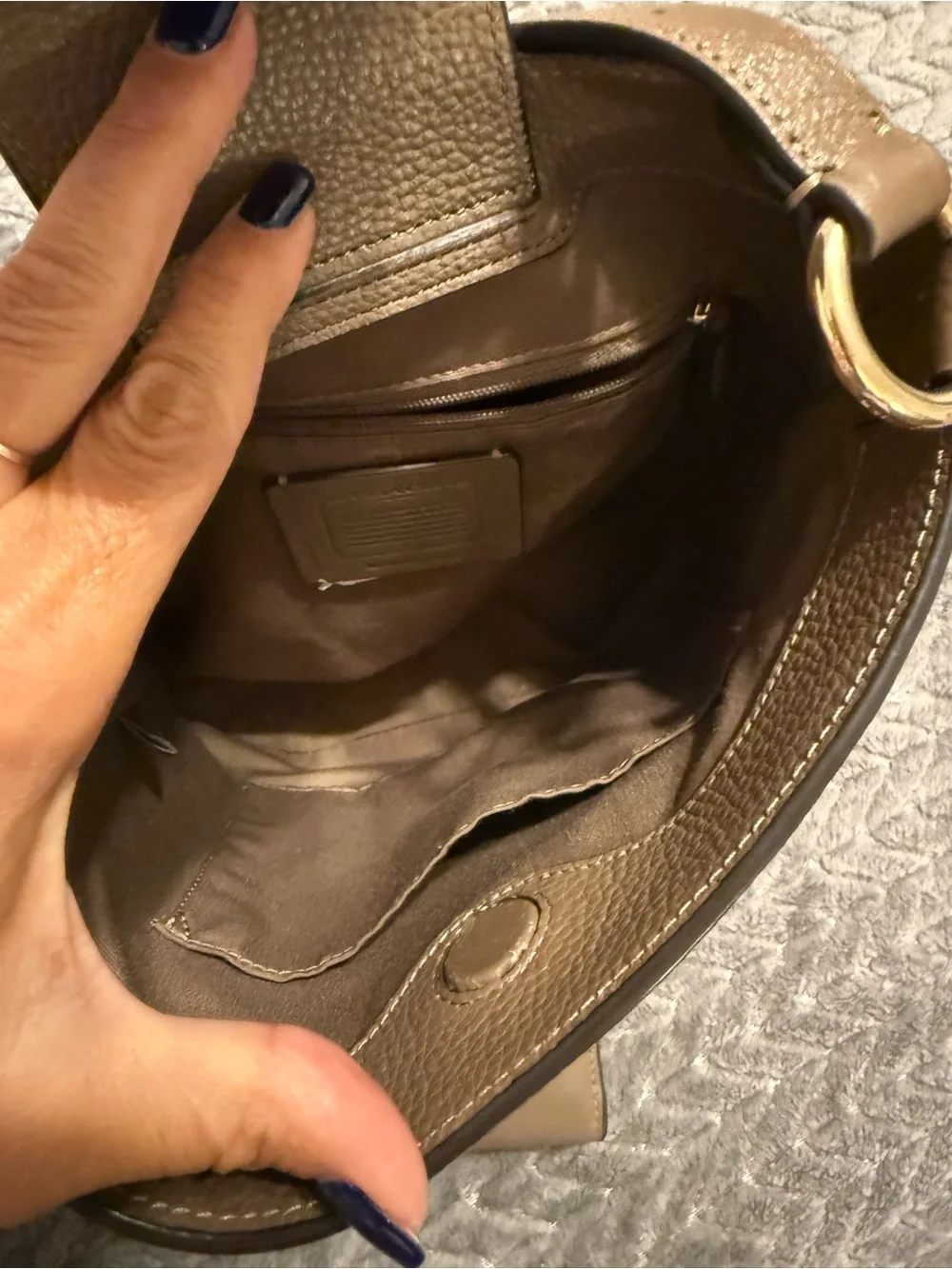 Coach hardware strap design