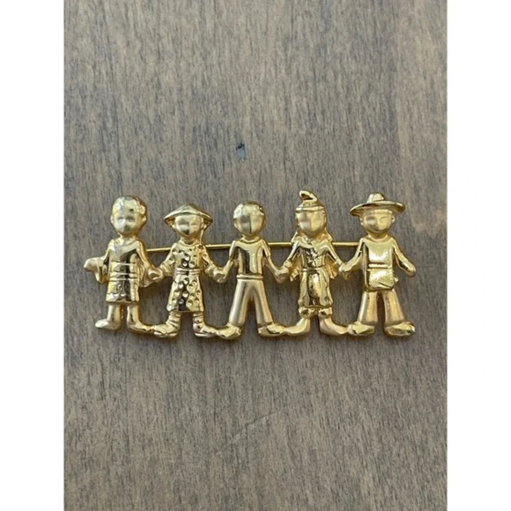 Ajc this brooch