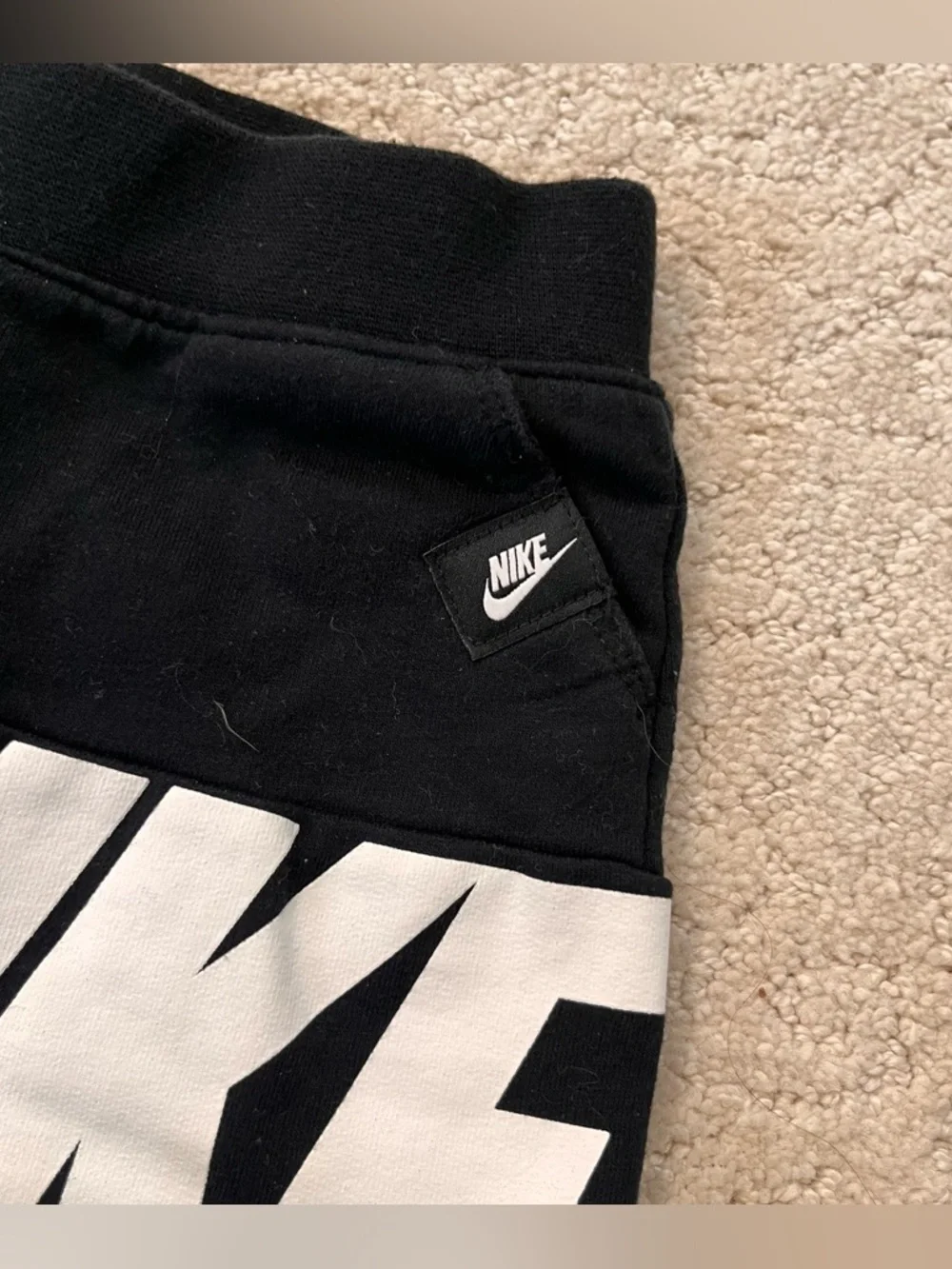 Nike under polyester pockets