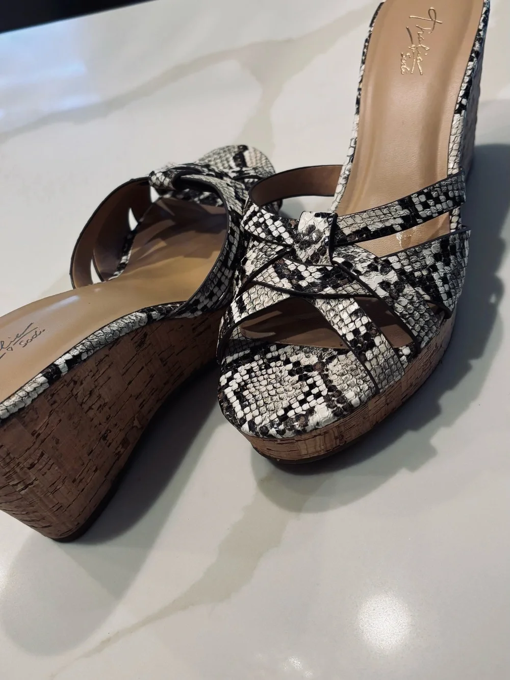 Thalia Sodi design outfits warm