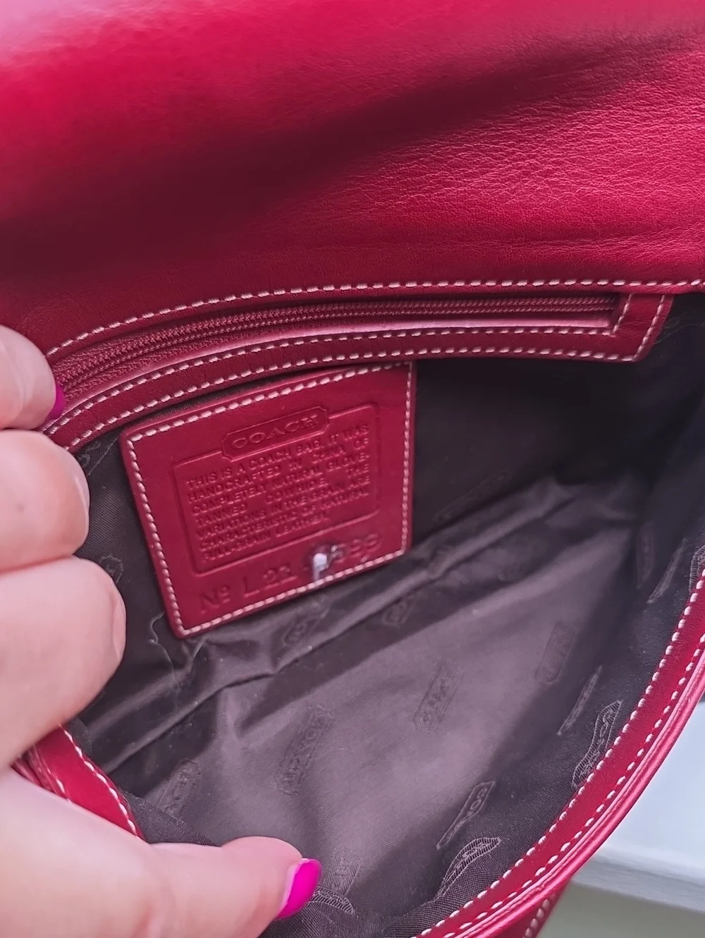 Coach authentic red