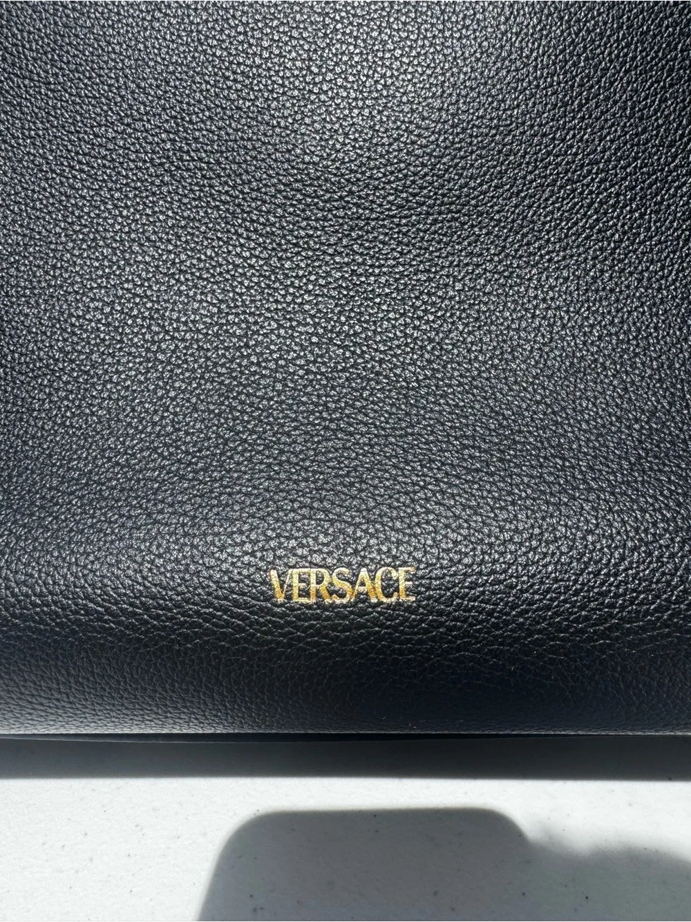 Versace pebbled no
