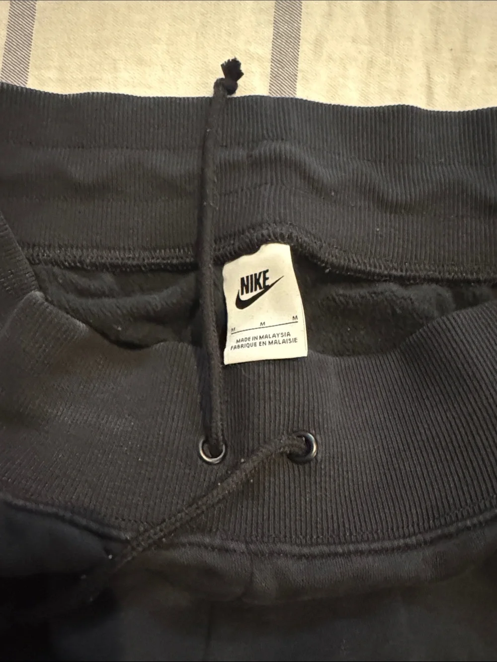 Nike Women’s Black Jogger Sweatpants with White Swoosh - M