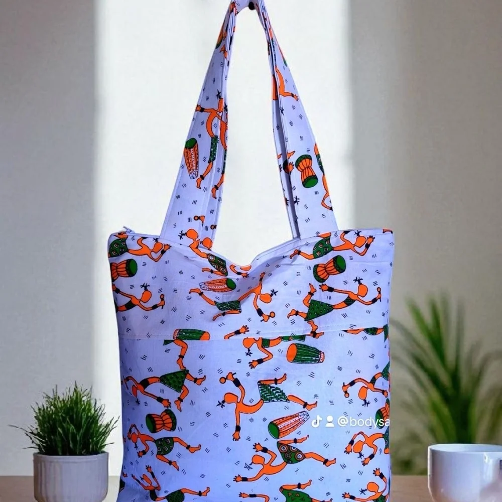 Vibrant Purple Tote Bag with Artistic Design