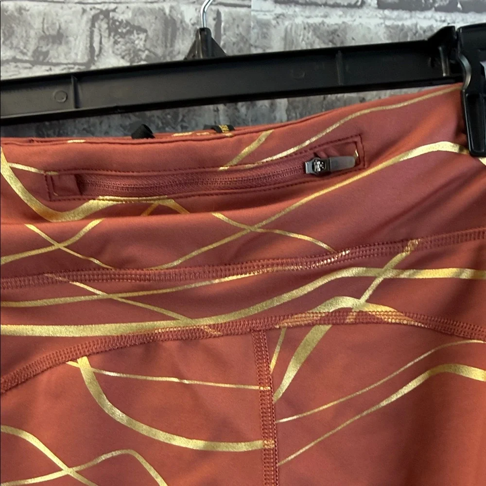 Nike leggings copper gold