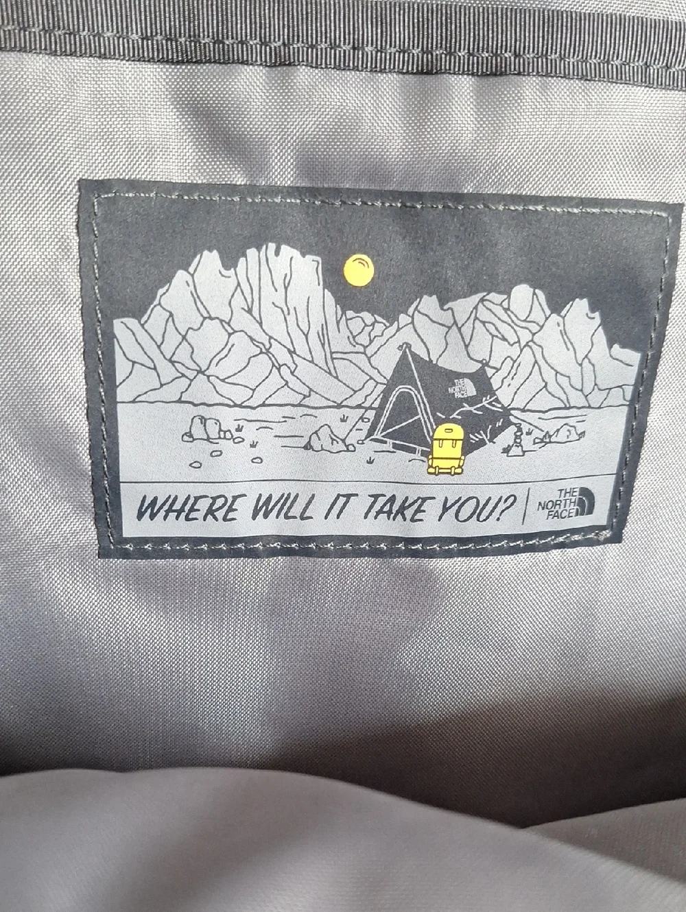 The North Face zip shoulder front