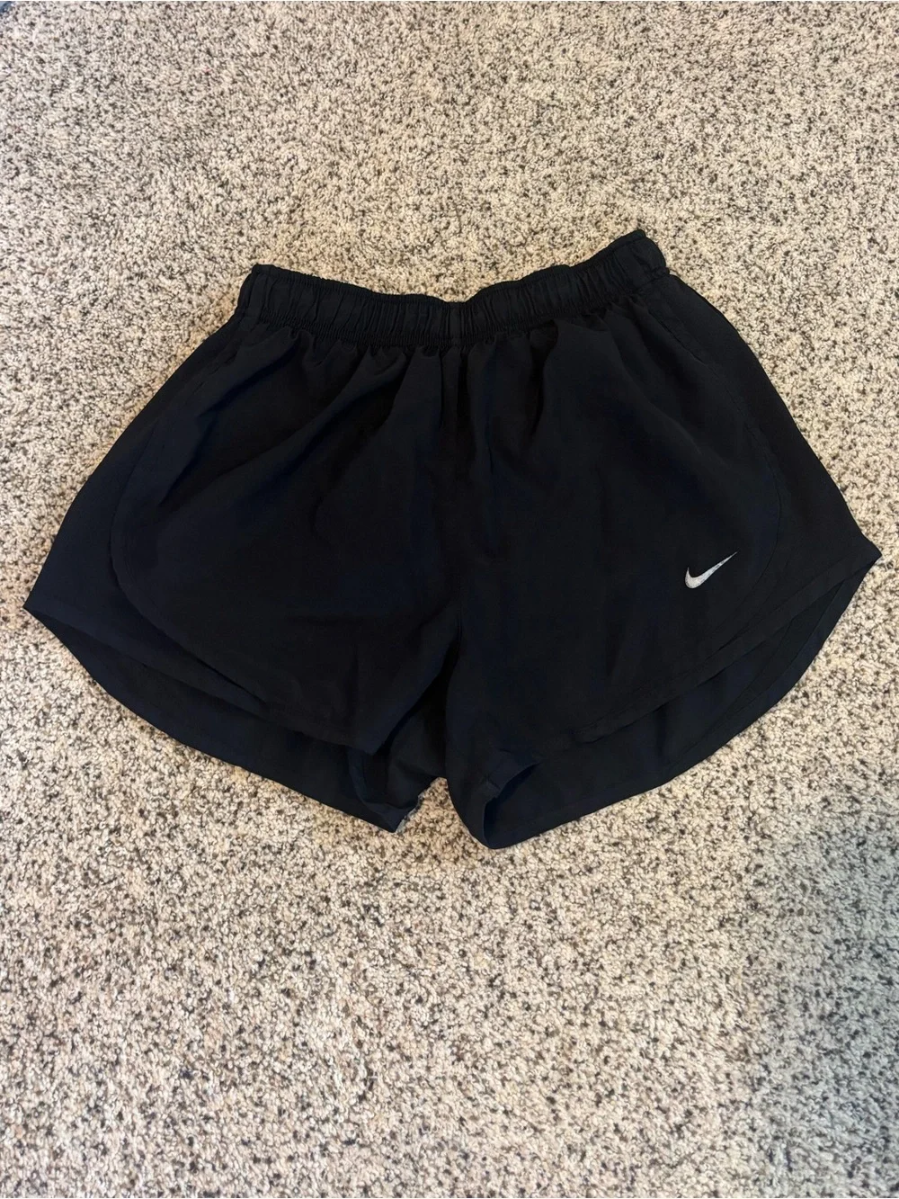 Black Nike running shorts