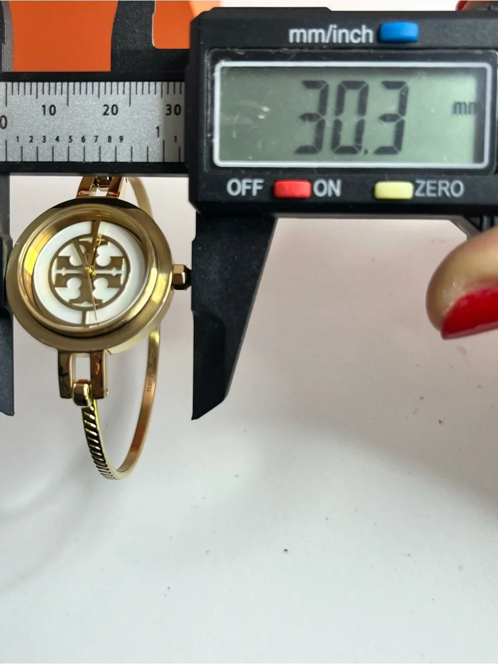 Tory Burch Reva TBW4029 ladies watch interchangeable rings.