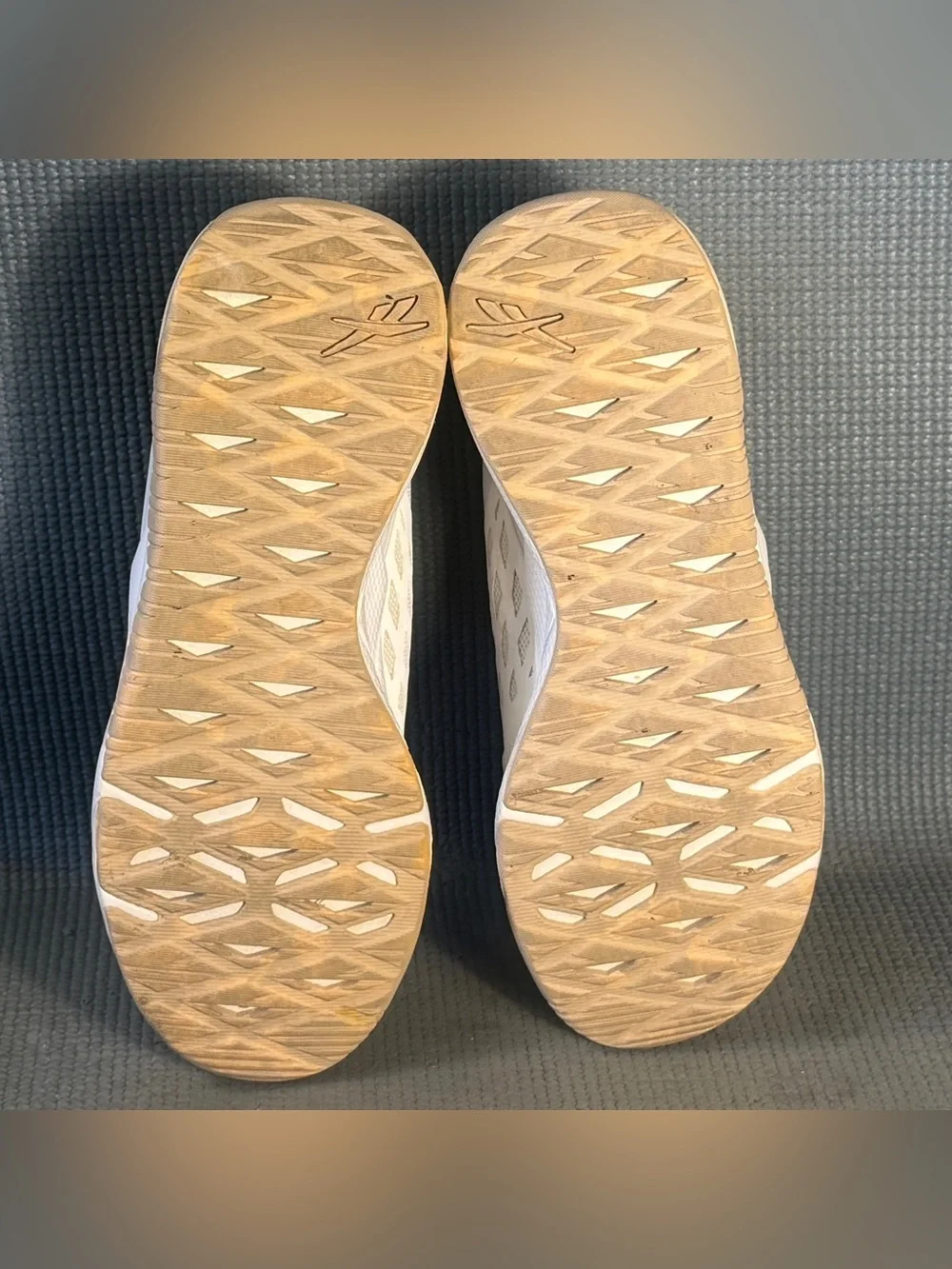 Reebok pricing cross