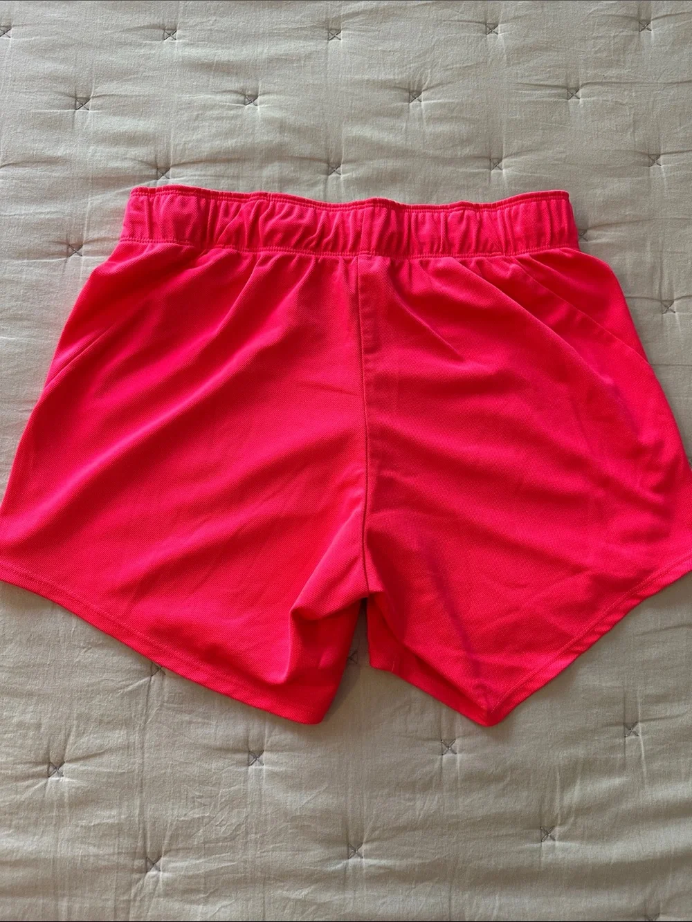 Nike Women's Neon Pink Athletic Shorts with Swoosh