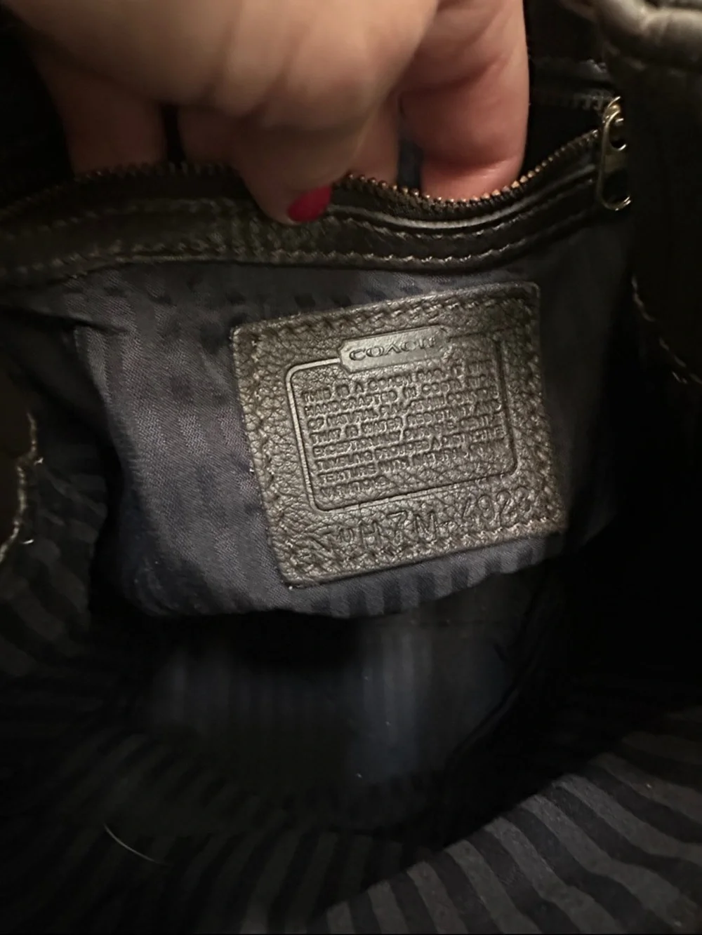 Coach compact pebbled