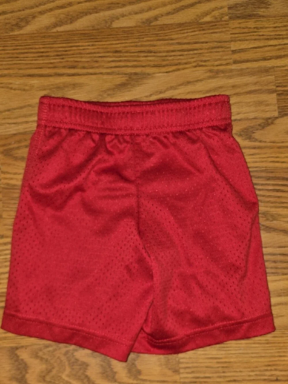 Nike Red Kids' Athletic Shorts with White Swoosh Accent