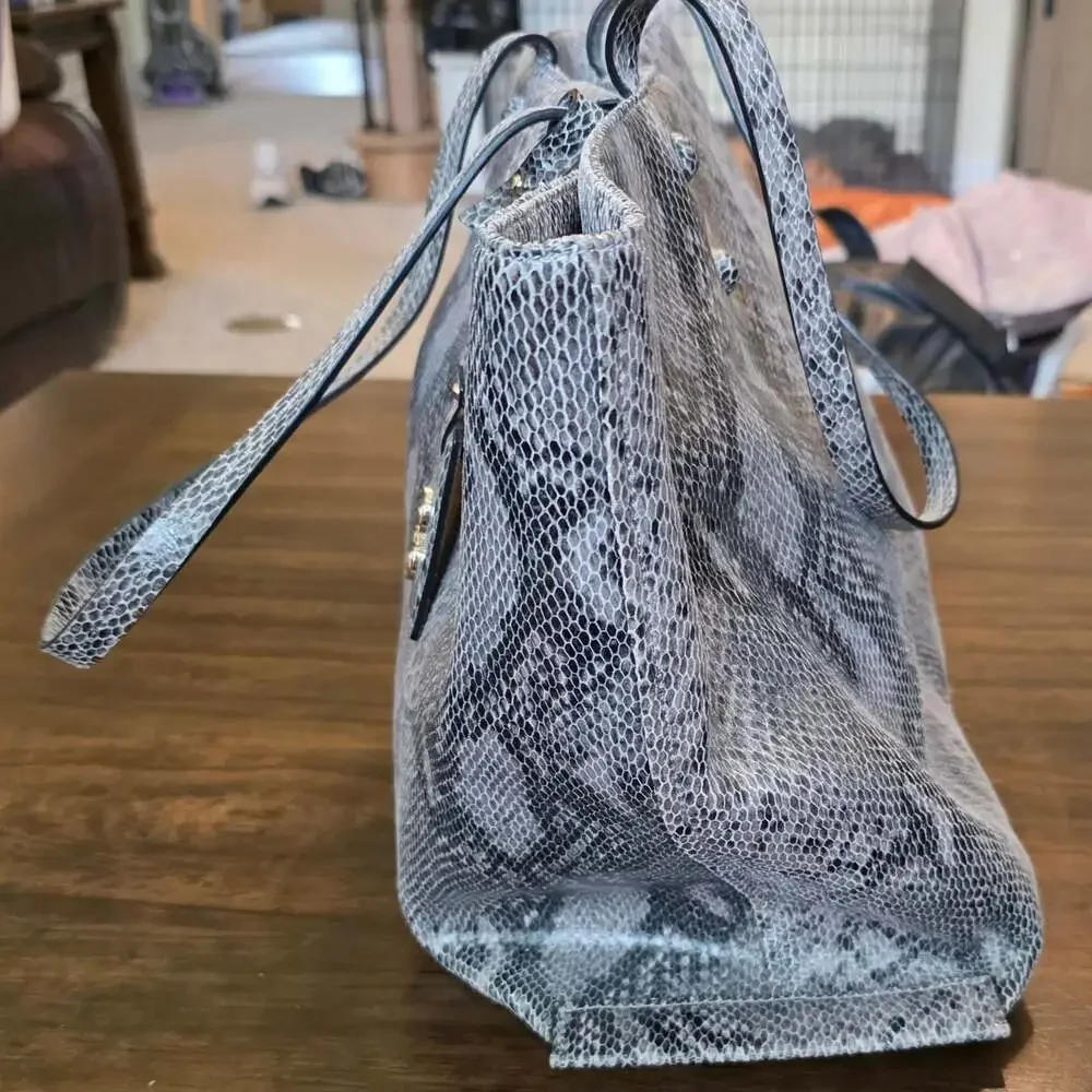 Cole Haan tote charm wear