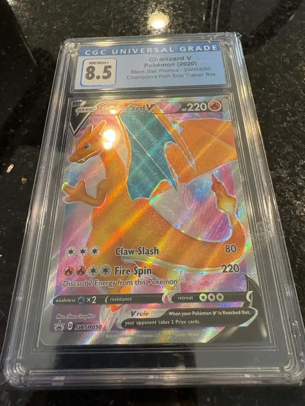 CGC Blue Label 8.5 Charizard V SWSH050 Champion’s Path Black Star Promo