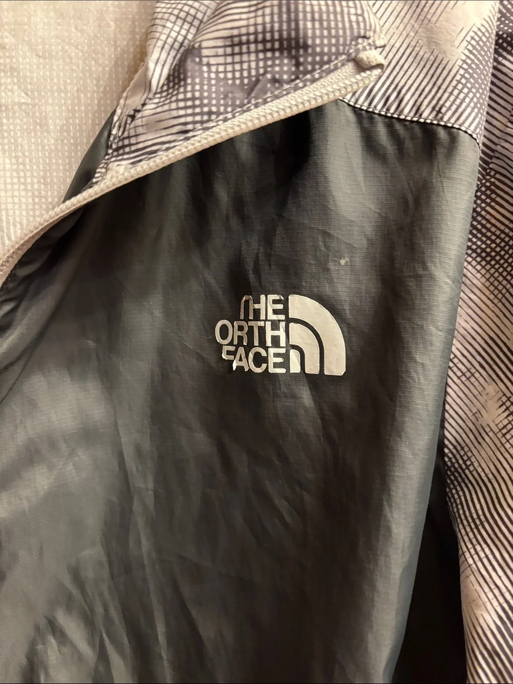 The North Face logo shell