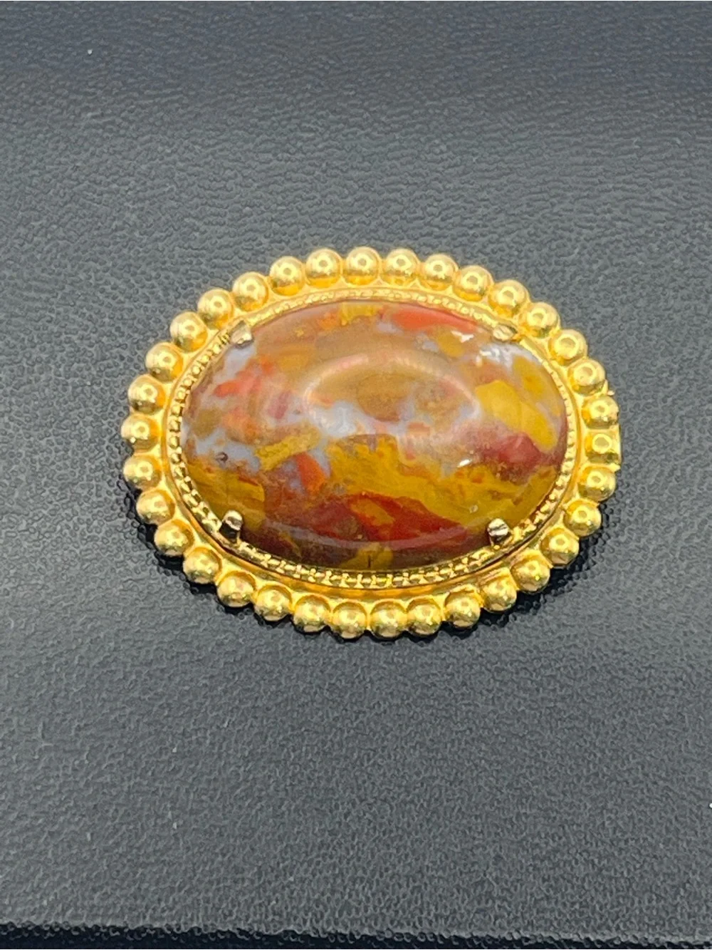 Orange red oval faux stone beaded scalloped edge gold tone vintage brooch pin