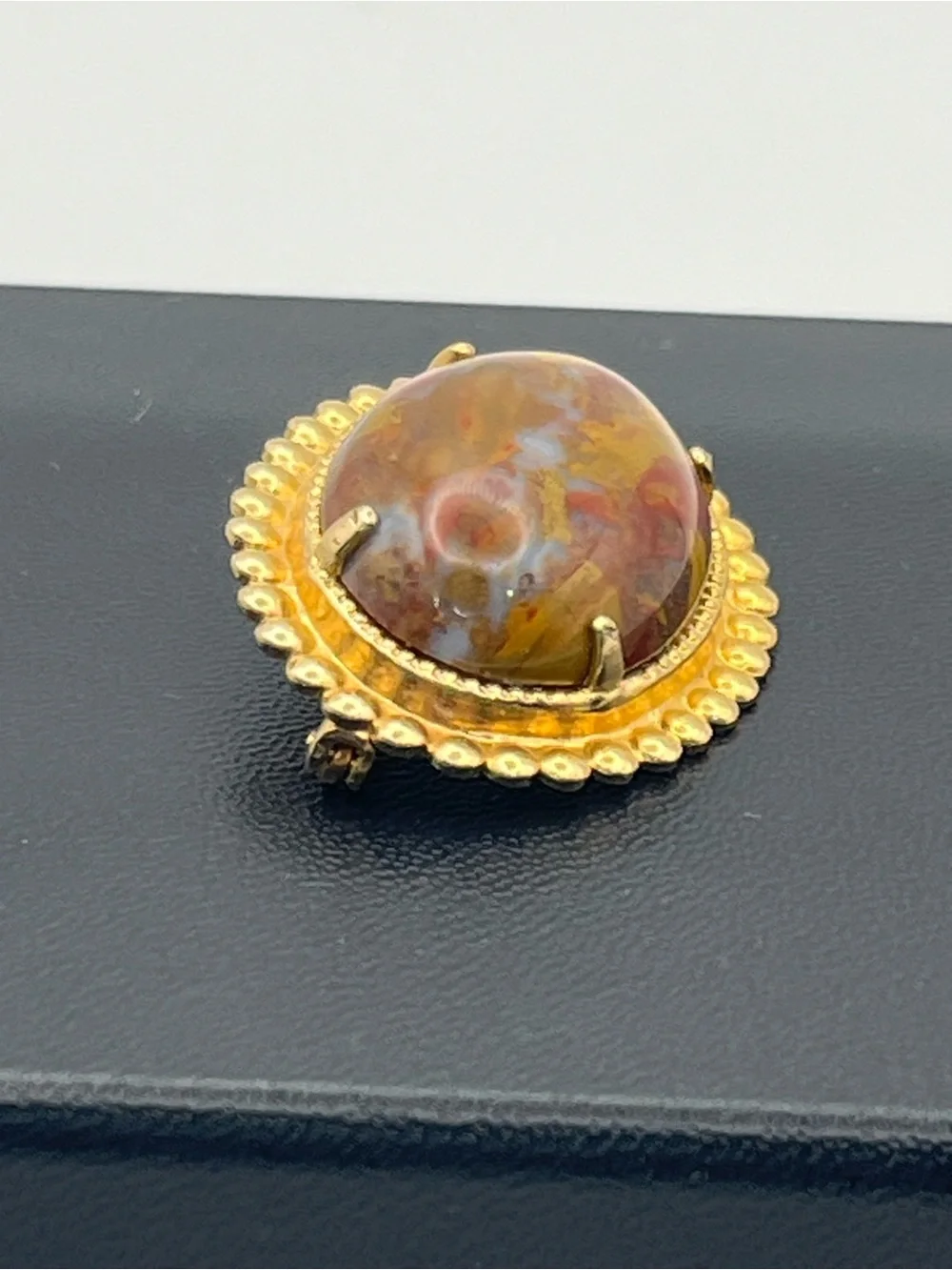 Orange red oval faux stone beaded scalloped edge gold tone vintage brooch pin